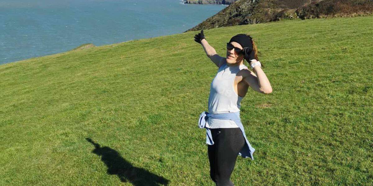 What does running do for your body Happy runner out in nature