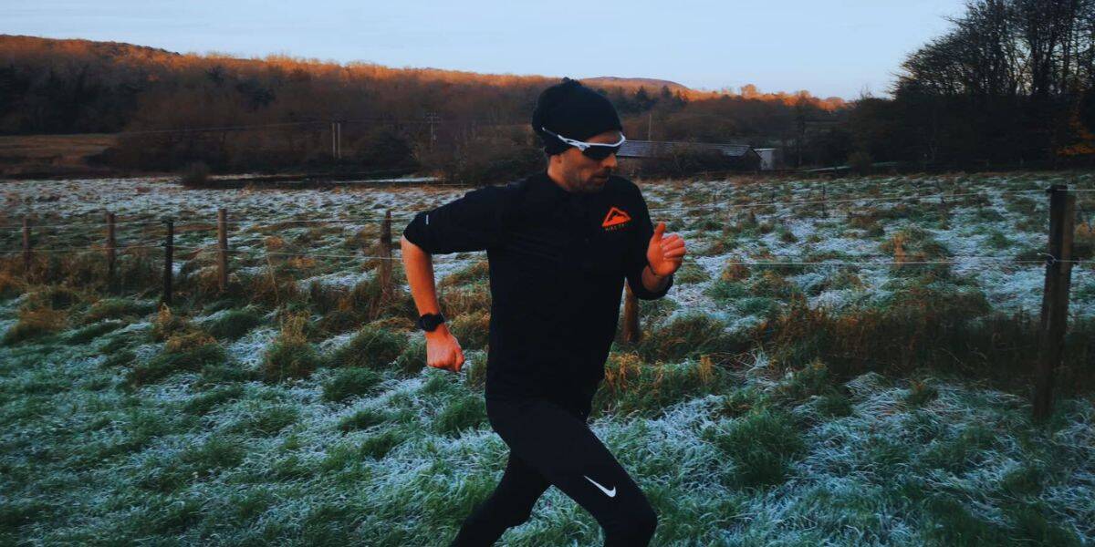 Winter Running A runner out on a winter grass run